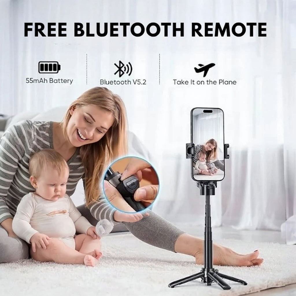 Woman holding a baby with a smartphone holder and free Bluetooth remote on a white background